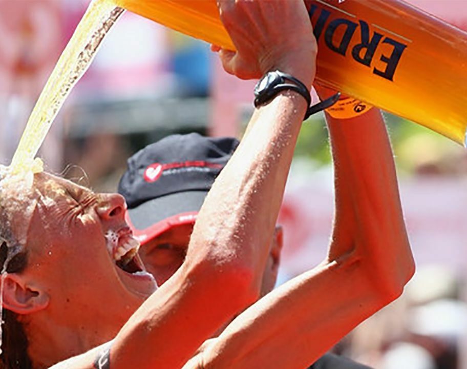 Chrissie Wellington celebrating win at Challenge Roth 2011