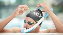 Swimmer using Powerbreather in pool Swimmer using Powerbreather in pool