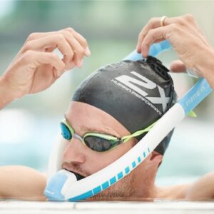 Swimmer using Powerbreather in pool Swimmer using Powerbreather in pool