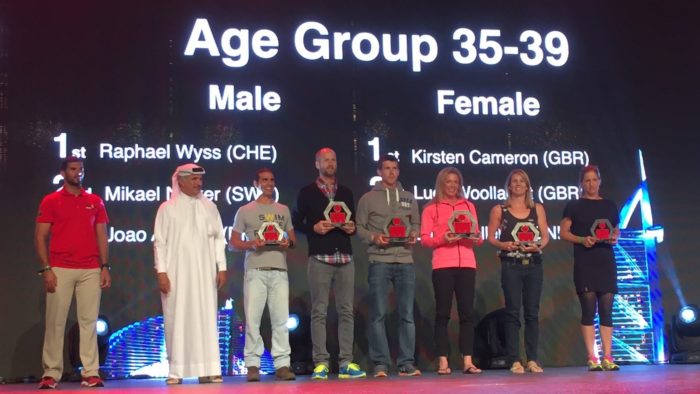 Kirsten Cameron collects her 35-39 Age-Group winners award at IRONMAN 70.3 Dubai