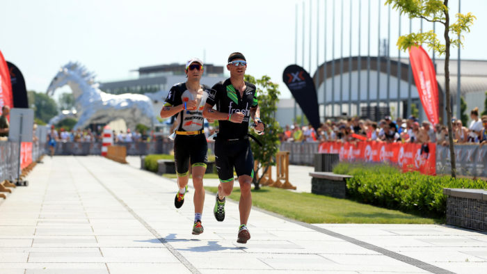 BRATISLAVA, SLOVAKIA - JUNE 3: Lionel Sanders of Canada and Sebastian Kienle of Germany contest first place on the run course during The Championship Challenge Triathlon on June 3, 2017 in Bratislava, Slovakia. (Photo by Stephen Pond/Getty Images for Challenge Triathlon) *** Local Caption *** Lionel Sanders; Sebastian Kienle