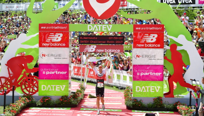 ROTH, GERMANY - JULY 09: Bart Aernouts of Belgium celebrates his first place of the DATEV Challenge Roth 2017 on July 9, 2017 in Roth, Germany. 5000 athletes are competing in todays race and 260,000 spectators watching the challenge. (Photo by Alexander Koerner/Getty Images)