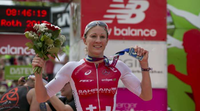 ROTH, GERMANY - JULY 09: Daniela Ryf of Switzerland celebrate the winning of the first place at the DATEV Challenge Roth 2017 on July 9, 2017 in Roth, Germany. 5000 athletes are competing in todays race and 260,000 spectators watching the challenge. (Photo by Jan Hetfleisch/Getty Images)