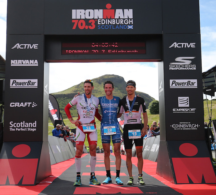 EDINBURGH, SCOTLAND - JULY 02: Andreas Raelert of Germany (C) celebrates winning Ironman 70.3 Edinburgh with Alessandro Degasperi (L) of Italy second and Yvan Jarrige (R) of France third on July 2, 2017 in Edinburgh, Scotland. (Photo by Nigel Roddis/Getty Images For Ironman )