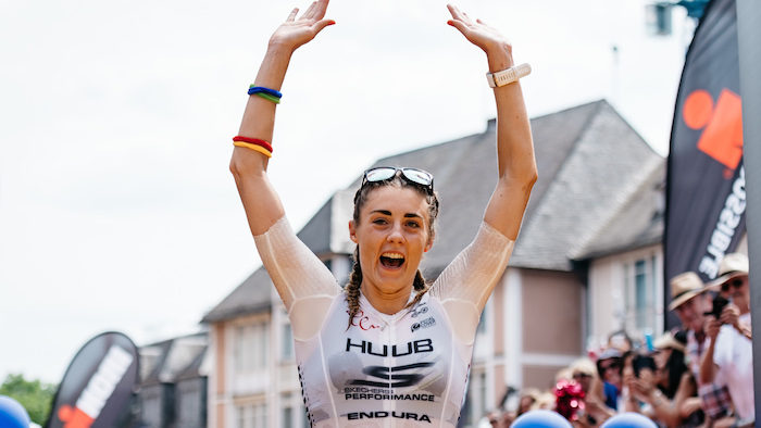 FRANKFURT AM MAIN, GERMANY - JULY 09: (EDITORS NOTE: This image was altered using a digital filter) Lucy Charles of Great Britain celebrates as she finishes second during the Ironman European Championships on July 9, 2017 in Frankfurt am Main, Germany. (Photo by Alexander Scheuber/Getty Images for Ironman)