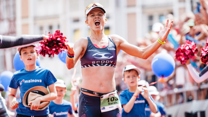 FRANKFURT AM MAIN, GERMANY - JULY 09: (EDITORS NOTE: This image was altered using a digital filter) Sarah Crowley celebrates after winning Women's Ironman European Championships on July 9, 2017 in Frankfurt am Main, Germany. (Photo by Alexander Scheuber/Getty Images for Ironman)