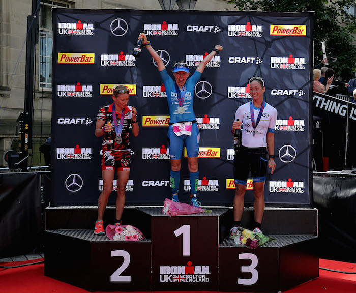 BOLTON, ENGLAND - JULY 16: Lucy Gossage of Britain (C) celebrates winning the women's race at Ironman UK with Diana Riesler of Germany (L) second and Nikki Bartlett of Britain (R) third on July 16, 2017 in Bolton, England. (Photo by Nigel Roddis/Getty Images for Ironman)