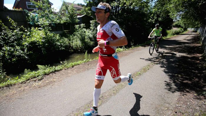 BOLTON, ENGLAND - JULY 16: Cyril Viennot of France competes in the run section of Ironman UK on July 16, 2017 in Bolton, England. (Photo by Nigel Roddis/Getty Images for Ironman)