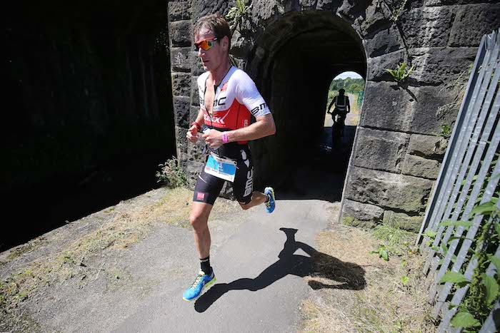 BOLTON, ENGLAND - JULY 16: Will Clarke of Britain competes in the run section of Ironman UK on July 16, 2017 in Bolton, England. (Photo by Nigel Roddis/Getty Images for Ironman)