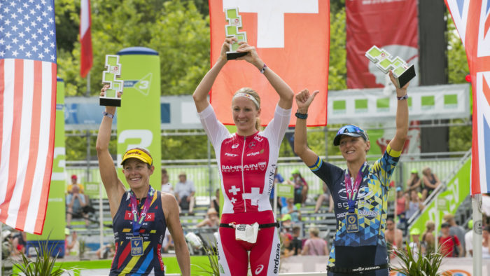 ROTH, GERMANY - JULY 09: (L-R) Lisa Roberts of the United Sates, Daniela Ryf of Switzerland and Laura Siddal celebrate the winning of the DATEV Challenge Roth 2017 on July 9, 2017 in Roth, Germany. 5000 athletes are competing in todays race and 260,000 spectators watching the challenge. (Photo by Jan Hetfleisch/Getty Images)