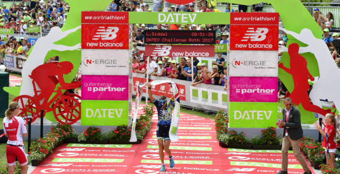 ROTH, GERMANY - JULY 09: Laura Siddal of Great Britain celebrates her second place of the DATEV Challenge Roth 2017 on July 9, 2017 in Roth, Germany. 5000 athletes compete in todays race and 260.000 spectators watched the challenge. (Photo by Alexander Koerner/Getty Images)