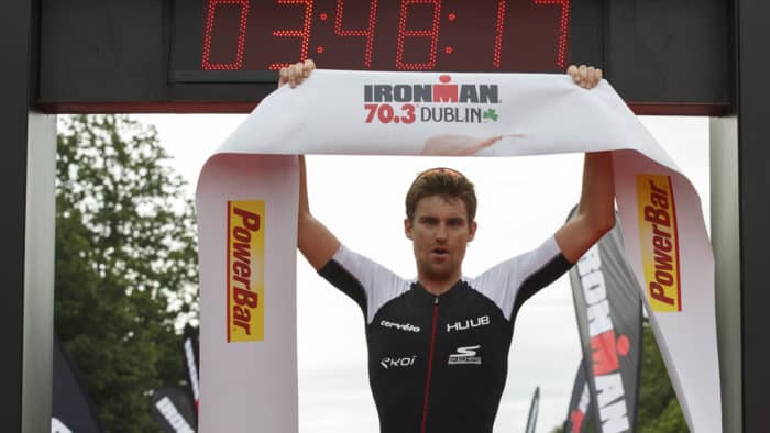 DUBLIN, IRELAND - AUGUST 20: Athlete David McNamee from Great Britain celebrates winning the men race of IRONMAN 70.3 Dublin triathlon at the finish line on August 20, 2017 in Dublin, Ireland. (Photo by Pablo Blazquez Dominguez/Getty Images for IRONMAN)