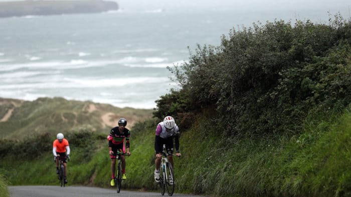 TENBY, WALES - SEPTEMBER 10: Athletes compete in the bike leg of IRONMAN Wales on September 10, 2017 in Tenby, Wales. (Photo by Bryn Lennon/Getty Images for IRONMAN)