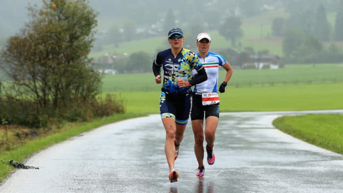 WALCHSEE, AUSTRIA - SEPTEMBER 03: Laura Siddall of Great Britain passes Margie Santimaria of Italy on the run course during the Challenge Walchsee-Kaiserwinkl Triathlon on September 3, 2017 in Walchsee, Austria. (Photo by Stephen Pond/Getty Images) *** Local Caption *** Laura Siddall; Margie Santimaria