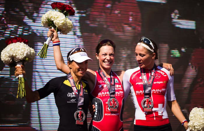 BAHRAIN, BAHRAIN - NOVEMBER 25: Holly Lawrence (C) of Great Britain in 1st place, Anne Haug (L) of Germany in 2nd place and Daniela Ryf (R) in 3rd place celebrate their positions in the women's race of IRONMAN 70.3 Middle East Championship Bahrain on November 25, 2017 in Bahrain, Bahrain. (Photo by Alex Caparros/Getty Images for IRONMAN)