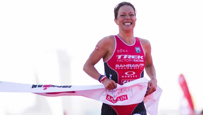 BAHRAIN, BAHRAIN - NOVEMBER 25: Holly Lawrence of Great Britain celebrates as she wins the women's race of IRONMAN 70.3 Middle East Championship Bahrain on November 25, 2017 in Bahrain, Bahrain. (Photo by Alex Caparros/Getty Images for IRONMAN)