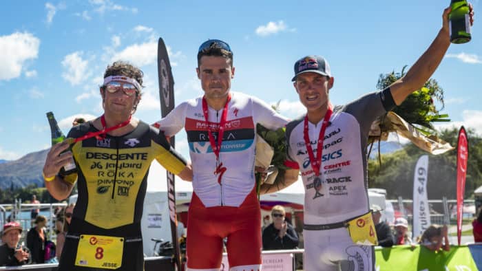 WANAKA, NEW ZEALAND - FEBRUARY 17: Men's podium (L-R, Jesse Thomas of USA 3rd, Javier Gomez of Spain winner and Braden Currie of NZ 2nd) for 2018 Challenge Wanaka Half Pro event on February 17, 2018 in Wanaka, New Zealand. (Photo by Neil Kerr/Getty Images)