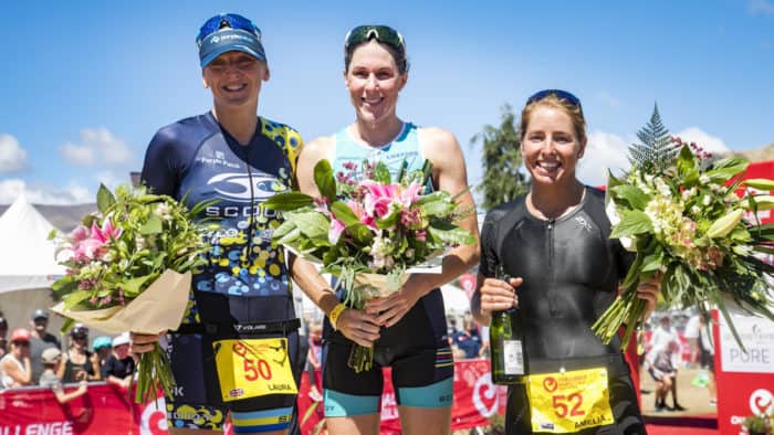 WANAKA, NEW ZEALAND - FEBRUARY 17: Women's Pro Half podium (L-R, Laura Siddall of GB 2nd, Annabel Luxford of Aus winner & Amelia Watkinson of NZ in 3rd) - 2018 Challenge Wanaka on February 17, 2018 in Wanaka, New Zealand. (Photo by Neil Kerr/Getty Images)