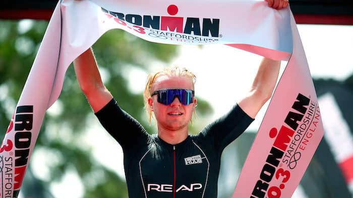 LICHFIELD, ENGLAND - JUNE 10: Elliot Smales of Great Britain celebrates as he wins the mens pro race during the IRONMAN 70.3 Staffordshire on June 10, 2018 in Lichfield, England. (Photo by Charlie Crowhurst/Getty Images for IRONMAN)