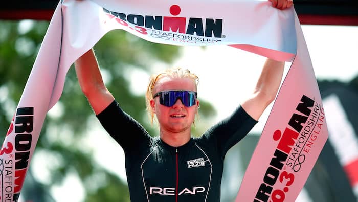 LICHFIELD, ENGLAND - JUNE 10: Elliot Smales of Great Britain celebrates as he wins the mens pro race during the IRONMAN 70.3 Staffordshire on June 10, 2018 in Lichfield, England. (Photo by Charlie Crowhurst/Getty Images for IRONMAN)