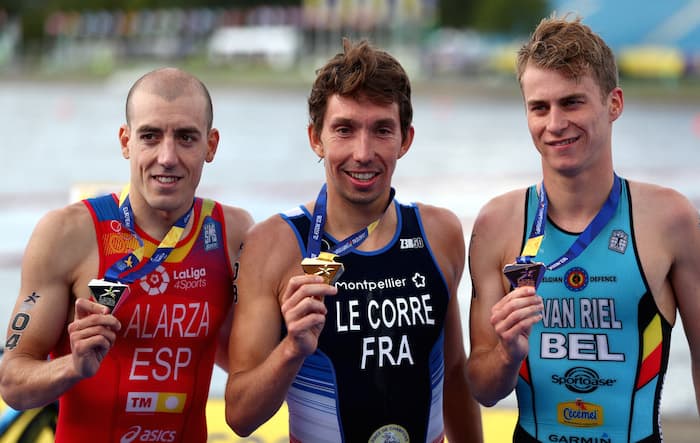 GLASGOW, SCOTLAND - AUGUST 10: Silver medalist Fernando Alarza of Spain, Gold medalist Pierre Le Corre of France and Bronze medalist Marten Van Riel of Belgium pose with their respective medals after the Men's Triathlon Final on Day Nine of the European Championships Glasgow 2018 at Strathclyde Country Park on August 10, 2018 in Glasgow, Scotland. This event forms part of the first multi-sport European Championships. (Photo by Dan Istitene/Getty Images)