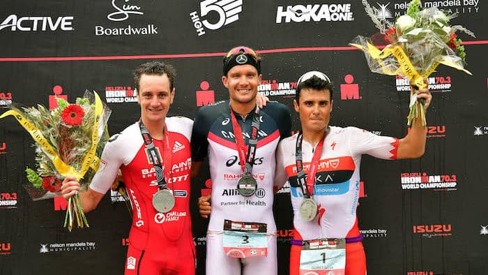 PORT ELIZABETH - SEPTEMBER 2: (L-R) Winner Podium of 2nd Place Alistair Brownlee of Great Britain, 1st Place Jan Frodeno of Germany and 3rd Place Javier Gomez Noya of Spain celebrate on the winner's podium during the Isuzu IRONMAN 70.3 World Championship Men in Port Elizabeth, South Africa on September 2, 2018. Over 4,500 athletes from over 100 countries will be represented in this years 70.3 World Championship. (Photo by Donald Miralle/Getty Images for IRONMAN).