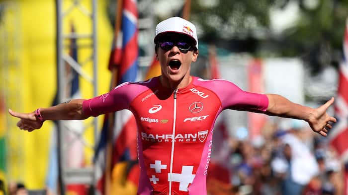 KAILUA KONA, HI - OCTOBER 13: Daniela Ryf of Switzerland celebrates after setting the course record of 8:26:16 to win the IRONMAN World Championships brought to you by Amazon on October 13, 2018 in Kailua Kona, Hawaii. (Photo by Nils Nilsen/Getty Images for IRONMAN)