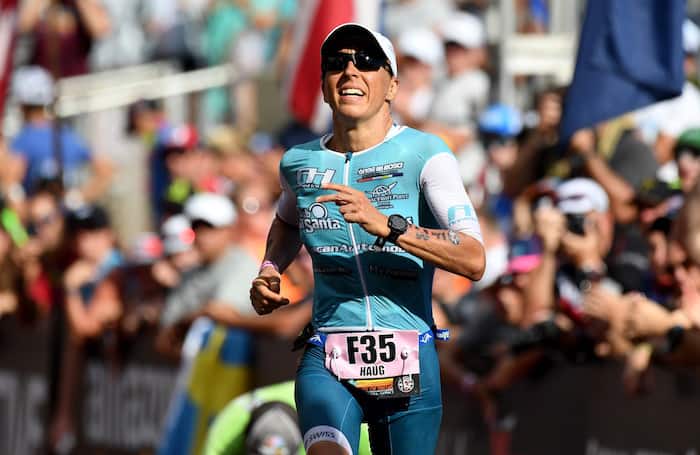 KAILUA KONA, HI - OCTOBER 13: Anne Haug of Germany celebrates after finishing third during the IRONMAN World Championships brought to you by Amazon on October 13, 2018 in Kailua Kona, Hawaii. (Photo by Nils Nilsen/Getty Images for IRONMAN)