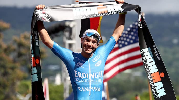 KAILUA KONA, HI - OCTOBER 13: Patrick Lange of Germany celebrates after setting a course record of 7:52:39 to win the IRONMAN World Championships brought to you by Amazon on October 13, 2018 in Kailua Kona, Hawaii. (Photo by Al Bello/Getty Images for IRONMAN)