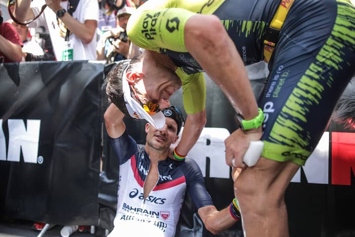 FRANKFURT AM MAIN, GERMANY - JUNE 30: Jan Frodeno of Germany and Sebastian Kienle of Germany shake hands after the Mainova IRONMAN European Championship on June 30, 2019 in Frankfurt am Main, Germany. (Photo by Joern Pollex/Getty Images for IRONMAN)