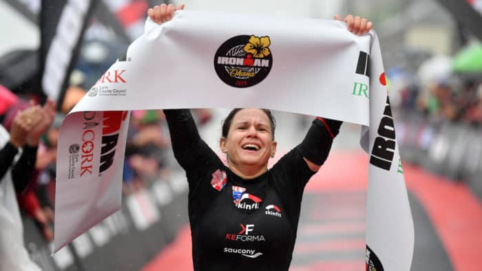 CORK, IRELAND - JUNE 23: Emma Bilham of Switzerland crosses the line to win during the IRONMAN Ireland on June 23, 2019 in Cork, Ireland. (Photo by Dan Mullan/Getty Images for IRONMAN)