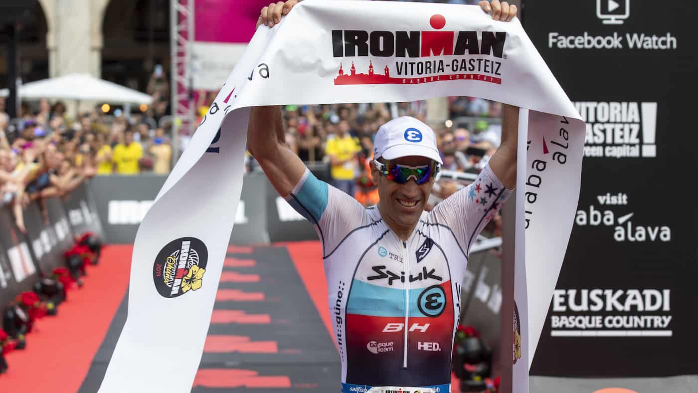 VITORIA, SPAIN - JULY 14: Athlete Eneko Llanos of Spain celebrates winning the men's race of Ironman Vitoria-Gasteiz on July 14, 2019 in Vitoria, Spain. (Photo by Pablo Blazquez Dominguez/Getty Images for IRONMAN)