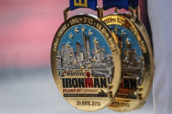 FRANKFURT AM MAIN, GERMANY - JUNE 30: Ironman medals are pictured during Mainova IRONMAN European Championship on June 30, 2019 in Frankfurt am Main, Germany. (Photo by Joern Pollex/Getty Images for IRONMAN)