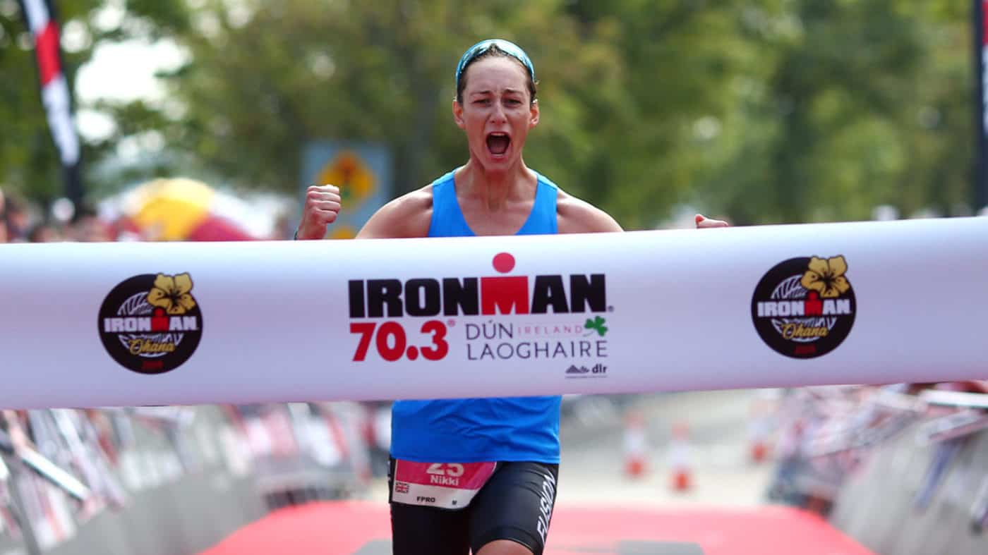 DUN LAOGHAIRE, IRELAND - AUGUST 25: Nikki Bartlett of Great Britain celebrates as she wins the womens race during IRONMAN 70.3 Dun Laoghaire on August 25, 2019 in Dun Laoghaire, Ireland. (Photo by Charlie Crowhurst/Getty Images for IRONMAN) *** Local Caption *** Nikki Bartlett