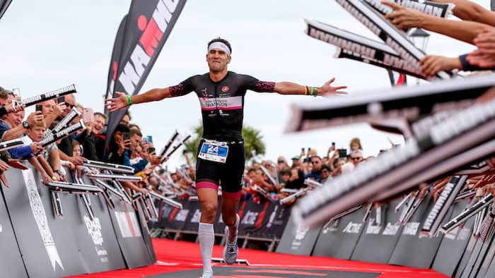 TENBY, WALES - SEPTEMBER 15: Amaud Guilloux of France celebrates winning Ironman Wales on September 15, 2019 in Tenby, Wales. (Photo by Nigel Roddis/Getty Images for IRONMAN)