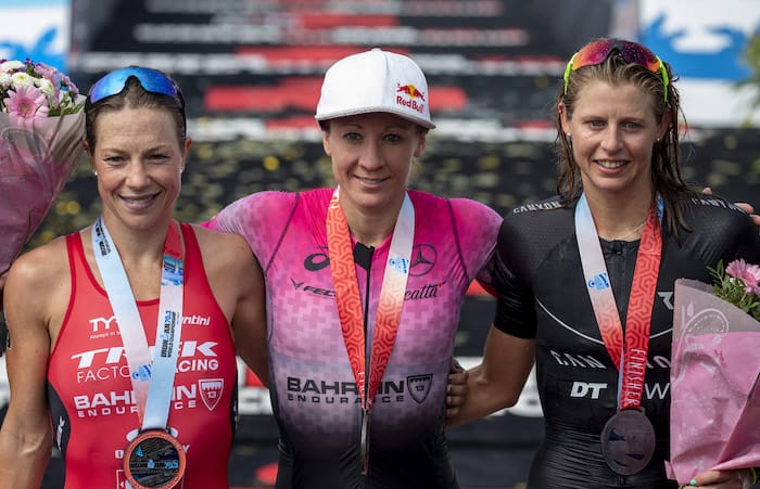 NICE, FRANCE - SEPTEMBER 07: Daniela Ryf of Switzerland (C) (first place), Holly Lawrence of Britain (L) (second place) and Imogen Simmonds of Switzerland (R) (third place) pose for photographers at the finish line during IRONMAN 70.3 World Championship Women on September 07, 2019 in Nice, France. (Photo by Pablo Blazquez Dominguez/Getty Images for IRONMAN)