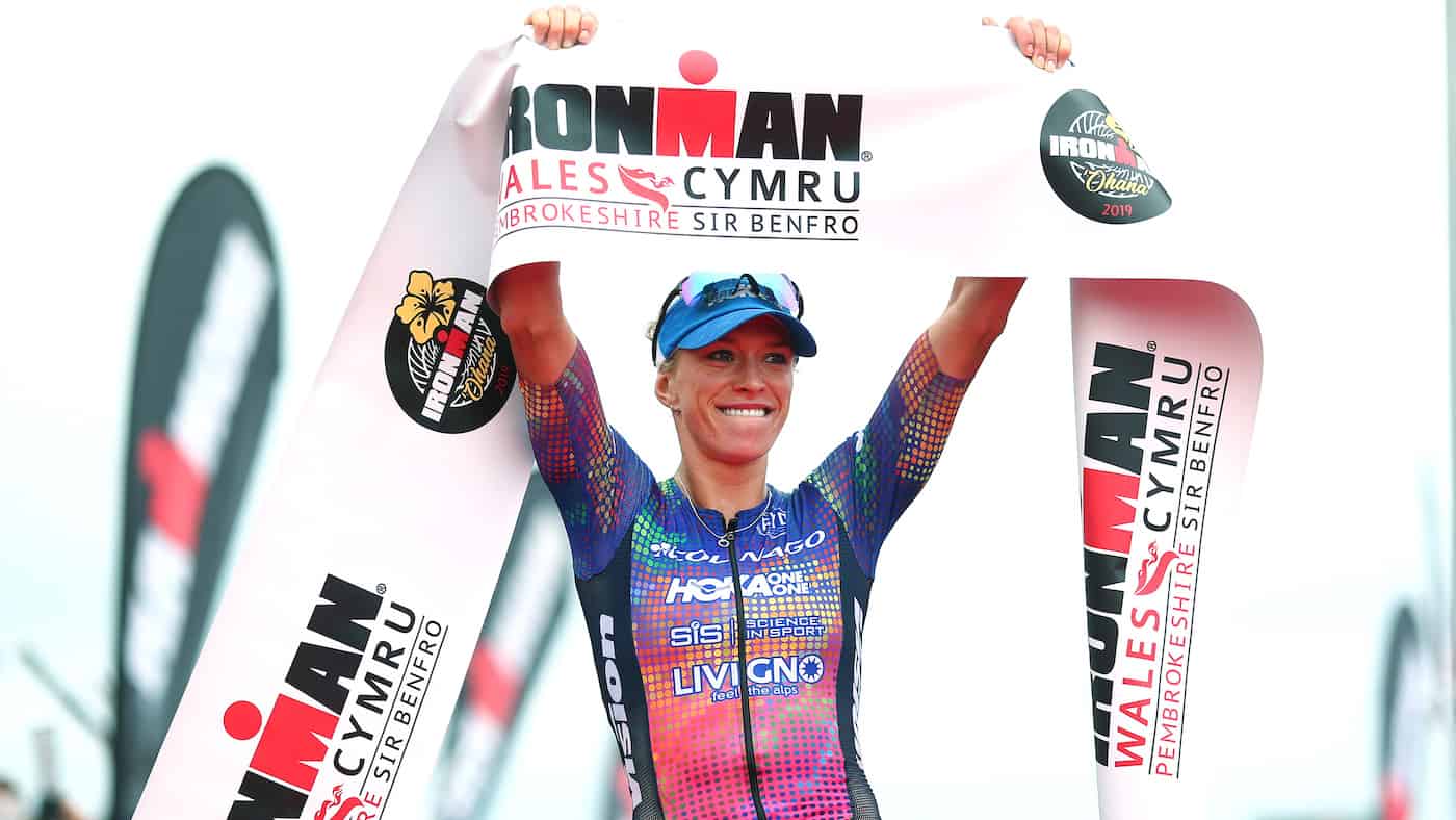 TENBY, WALES - SEPTEMBER 15: Simone Mitchell of Great Britain celebrates as she wins the female pro race during IRONMAN Wales on September 15, 2019 in Tenby, Wales. (Photo by Charlie Crowhurst/Getty Images for IRONMAN)