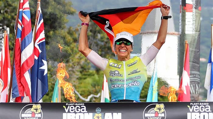 KAILUA KONA, HAWAII - OCTOBER 12: Anne Haug of Germany celebrates after winning the Ironman World Championships on October 12, 2019 in Kailua Kona, Hawaii. (Photo by Tom Pennington/Getty Images for IRONMAN)