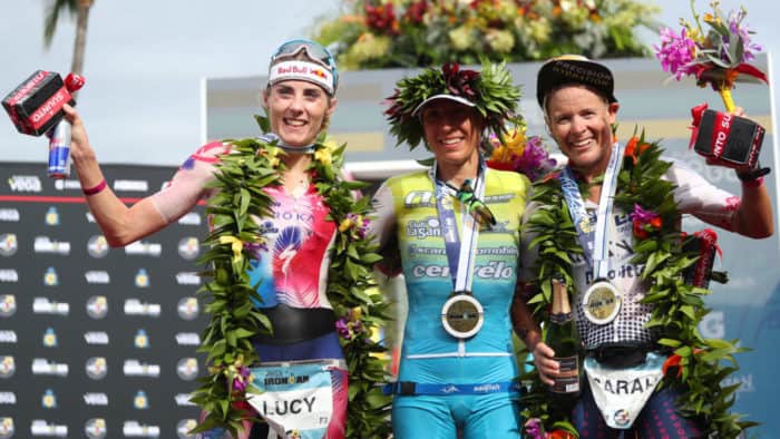 KAILUA KONA, HAWAII - OCTOBER 12: Lucy Charles-Barkley (2nd), Anne Haug (1st) and Sarah Crawley (3rd) celebrate after the Ironman World Championships on October 12, 2019 in Kailua Kona, Hawaii. (Photo by Tom Pennington/Getty Images for IRONMAN)