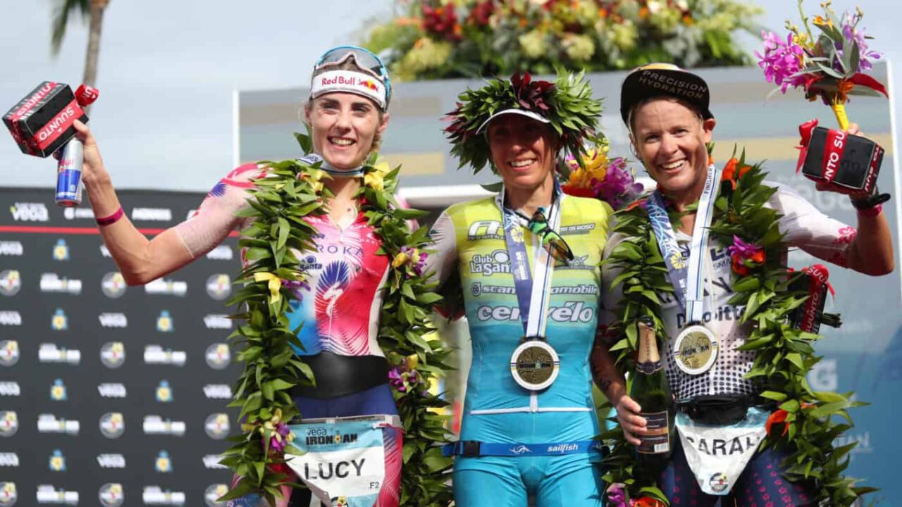 KAILUA KONA, HAWAII - OCTOBER 12: Lucy Charles-Barkley (2nd), Anne Haug (1st) and Sarah Crawley (3rd) celebrate after the Ironman World Championships on October 12, 2019 in Kailua Kona, Hawaii. (Photo by Tom Pennington/Getty Images for IRONMAN)