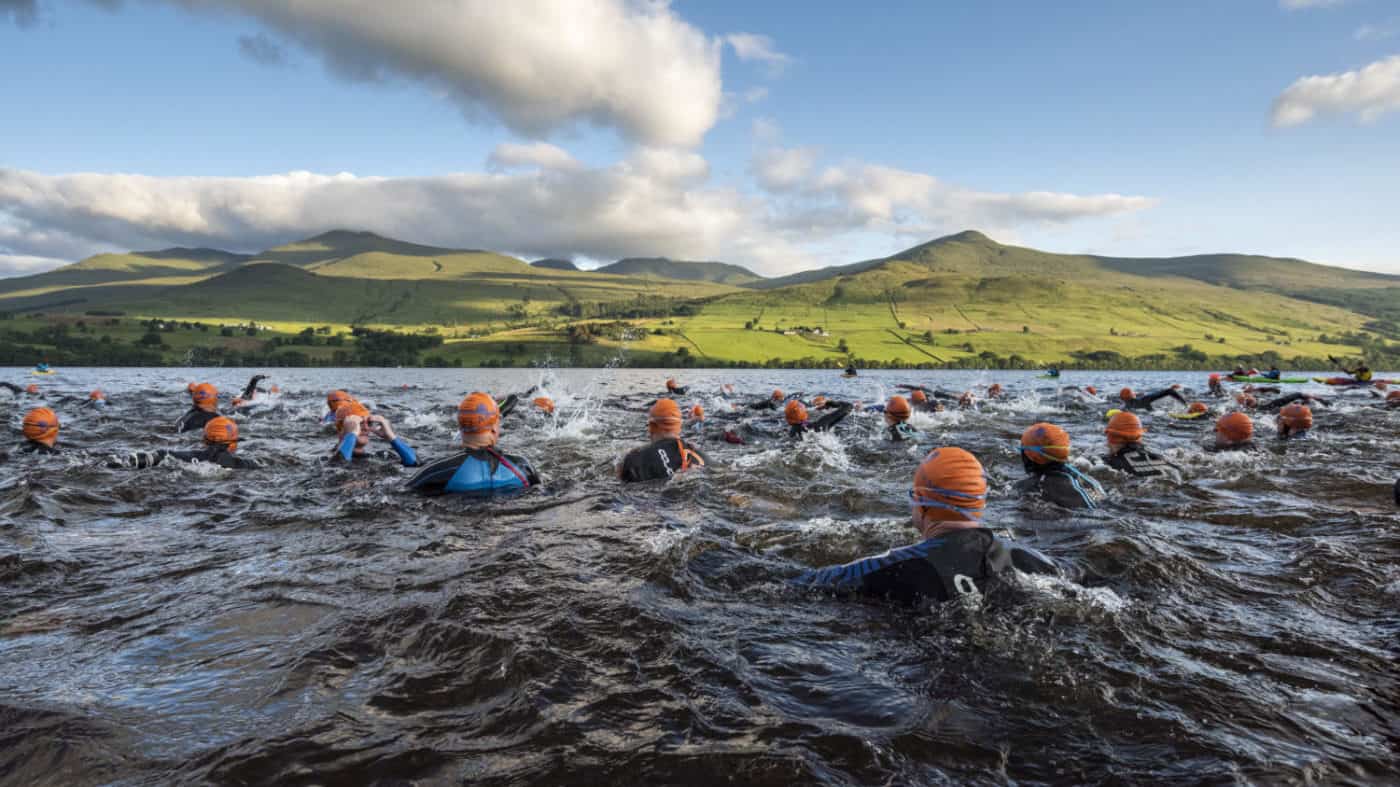 Participants start the Great Kindrochit Quadrathlon at 6am with a 1.3km swim across Loch Tay towards the seven Munro's (mountain over 900m height) they will ascend on the next stage.