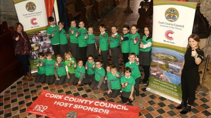 THUMBS UP FOR IRONKIDS: Helen Mulcahy (left), Cork County Council Senior Staff Officer and Polly O'Gorman (right), IRONKIDS Ireland Race Director with a group of eager IRONKIDS participants from Scoil Choráin and Bun Scoil Mhuire in Youghal.