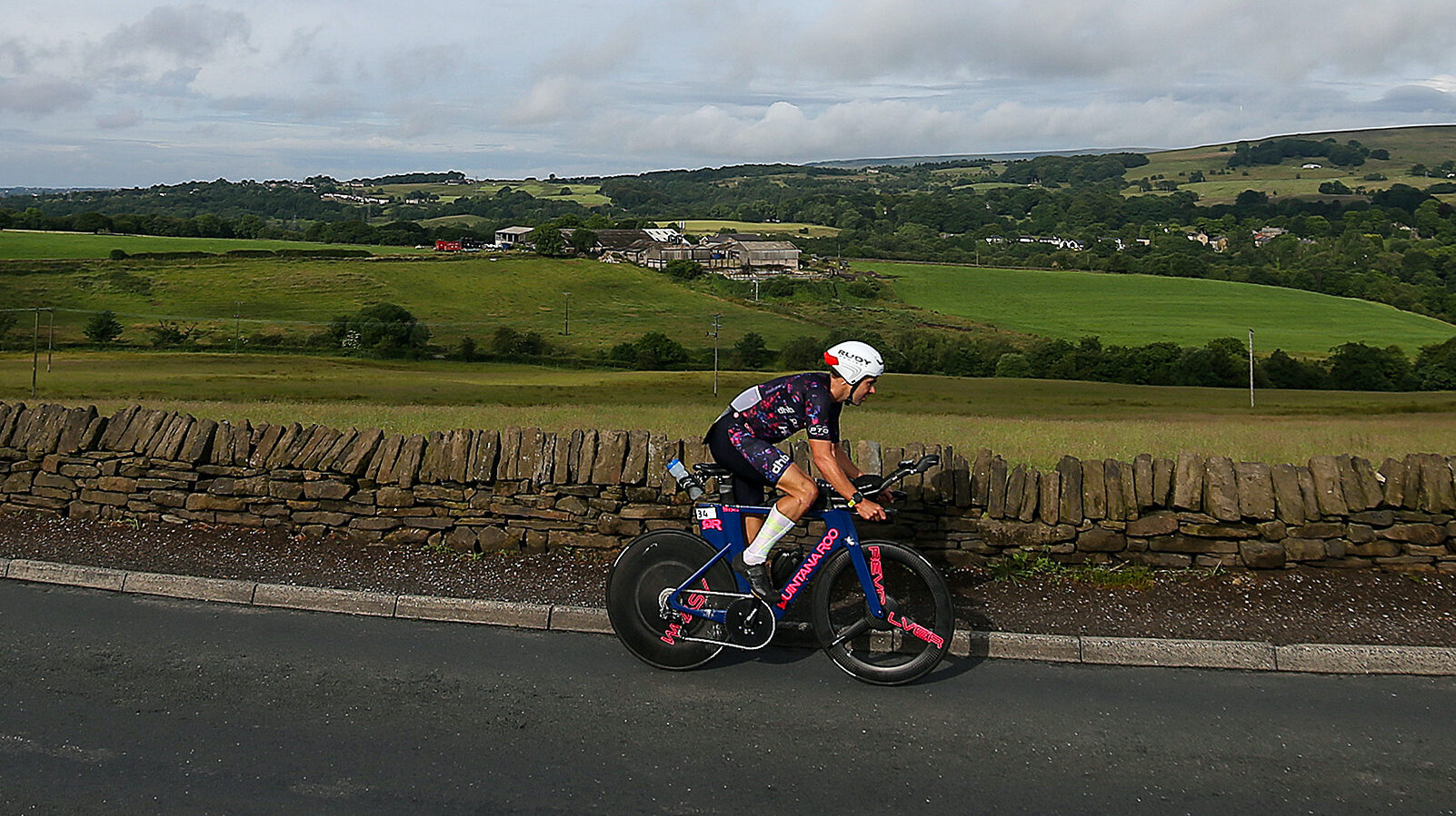 BOLTON, ENGLAND - JULY 04: An athlete competes in the bike section of Ironman UK on July 4, 2021 in Bolton, England. (Photo by Nigel Roddis/Getty Images for IRONMAN)