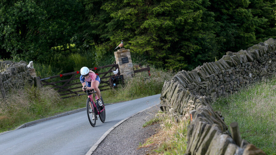 BOLTON, ENGLAND - JULY 04: An athlete competes in the bike section of Ironman UK on July 4, 2021 in Bolton, England. (Photo by Nigel Roddis/Getty Images for IRONMAN)