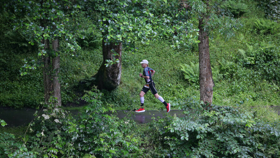 BOLTON, ENGLAND - JULY 04: An athlete competes in the bike section of Ironman UK on July 4, 2021 in Bolton, England. (Photo by Nigel Roddis/Getty Images for IRONMAN)