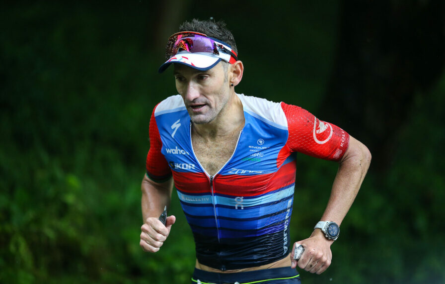 BOLTON, ENGLAND - JULY 04: Tim Don of Britain competes in the run section of Ironman UK on July 4, 2021 in Bolton, England. (Photo by Nigel Roddis/Getty Images for IRONMAN)