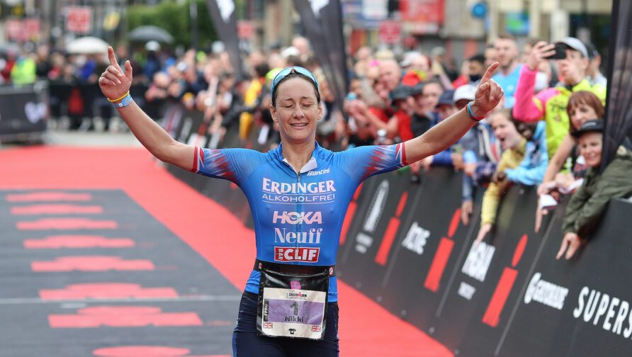 BOLTON, ENGLAND - JULY 04: Nikki Bartlett of Britain reacts after finishing 2nd in the women's race at Ironman UK on July 4, 2021 in Bolton, England. (Photo by Nigel Roddis/Getty Images for IRONMAN)