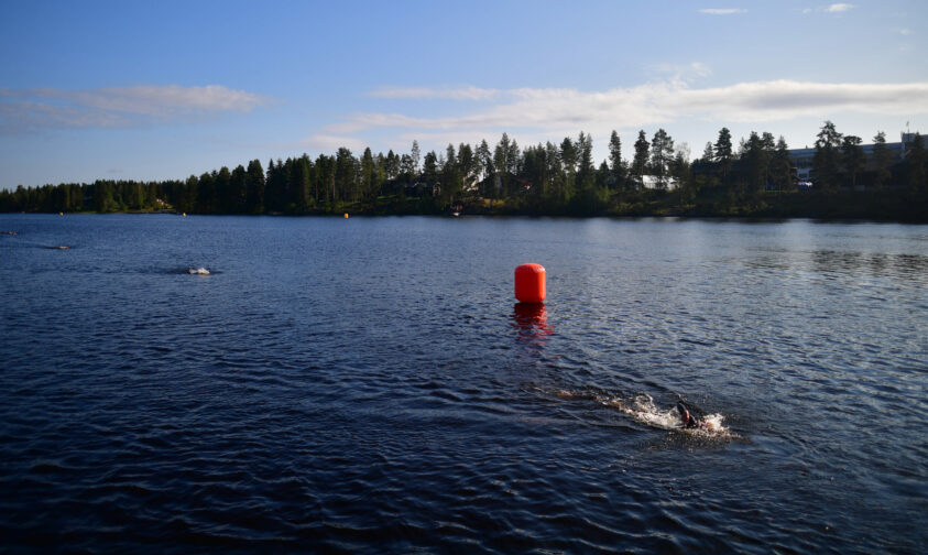 KUOPIO, FINLAND - AUGUST 14: Athletes perform on the swim leg during the IRONMAN Finland Kuopio-Tahko on August 14, 2021 in Kuopio, Finland. (Photo by Alexander Koerner/Getty Images for IRONMAN)