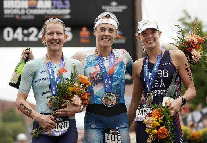 ST GEORGE, UTAH - SEPTEMBER 18: The Women's Pro Race Winners; first place Lucy Charles-Barclay of England (middle), second place Jeanni Metzler of South Africa (left) and third place Taylor Knibb of The United States (right) pose after the IRONMAN 70.3 World Championship on September 18, 2021 in St George, Utah.