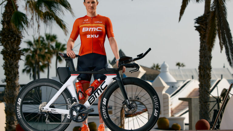 Kat Matthews with bike - BMC Pro Triathlon Team 2022